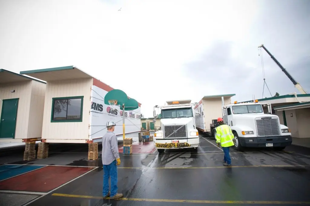 Portable classroom delivery and installation.