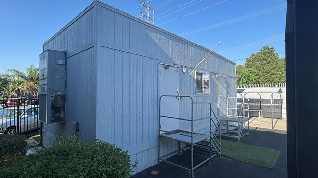 Used 14' x 30' modular office building for sale – front exterior and entry doors