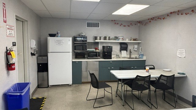 Used 14' x 30' modular office for sale – kitchenette with sink and cabinets